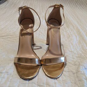 Lulu’s gold high heels